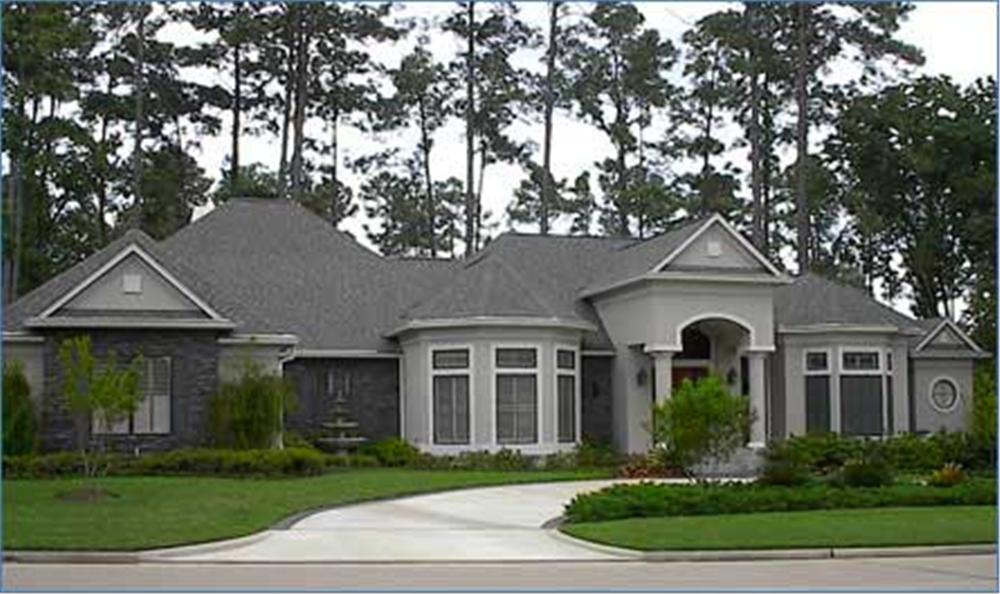 Front elevation of Luxury home (ThePlanCollection: House Plan #134-1270)