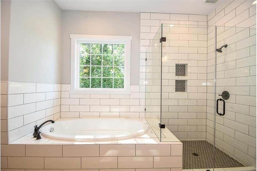 142-1166: Home Interior Photograph-Master Bathroom's Tub and Glass Shower