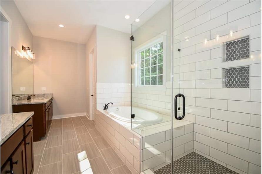 142-1166: Home Interior Photograph - View of Master Bath with Linen Closet in the Corner