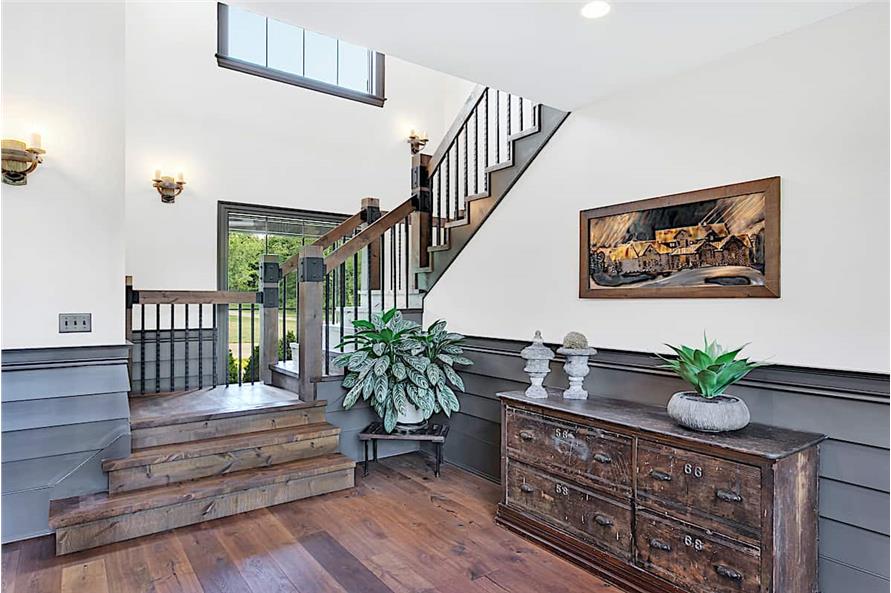 Entry Hall: Staircase of this 5-Bedroom,5164 Sq Ft Plan -161-1003
