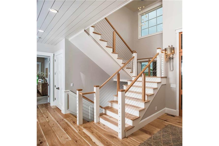 Entry Hall: Staircase of this 5-Bedroom,4784 Sq Ft Plan -4784