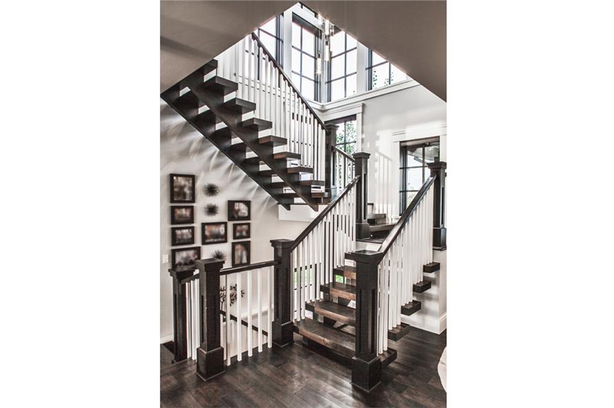 Entry Hall: Staircase of this 5-Bedroom,6563 Sq Ft Plan -6563