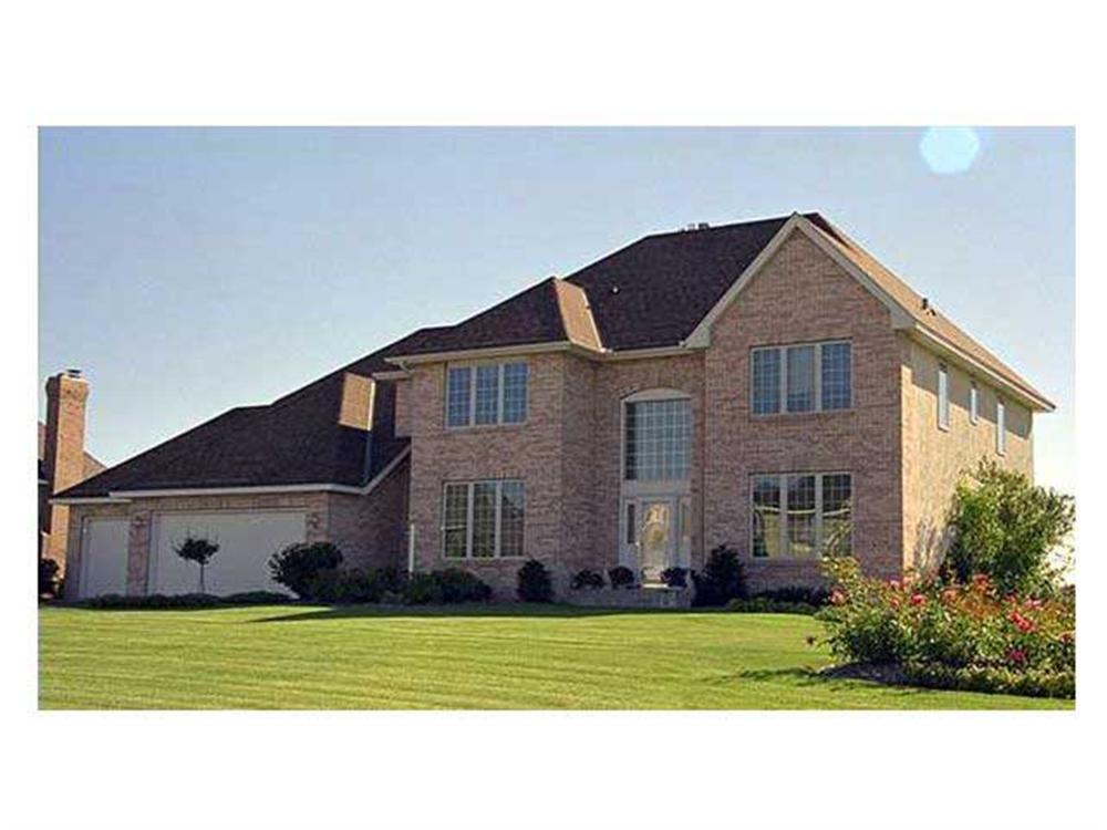 This image shows the front elevation of these European Home Plans (CLS-3207).