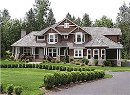 Large home on a landscaped lot illustrating article on shingle style homes