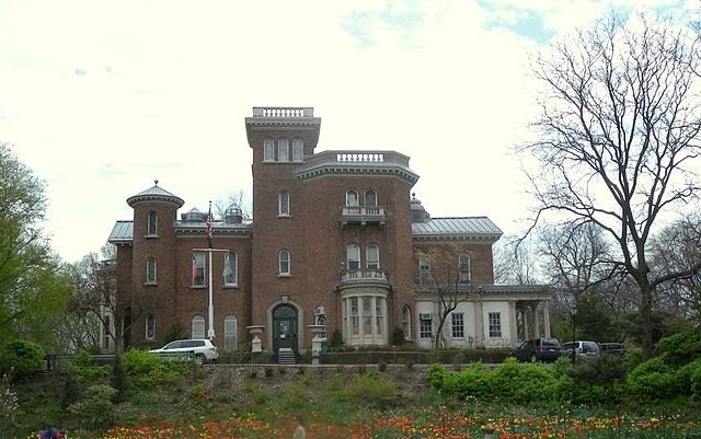 Litchfield Villa in its Italianate - Mediterranean architectural style surrounded by landscaped gardens.